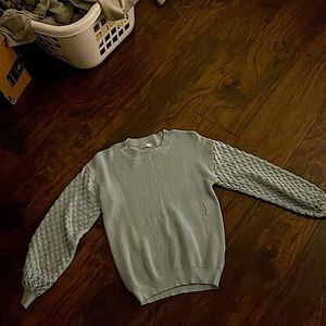 I am selling a light blue sweater the fabric is so soft! Size is 10/12